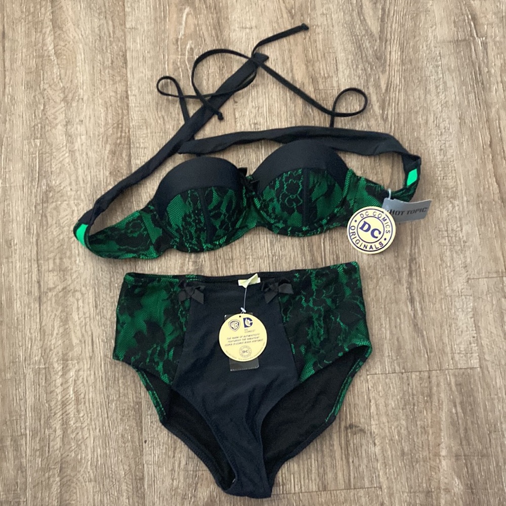 DC cosmic two piece swimsuit the top is a small and the bottom is a MD